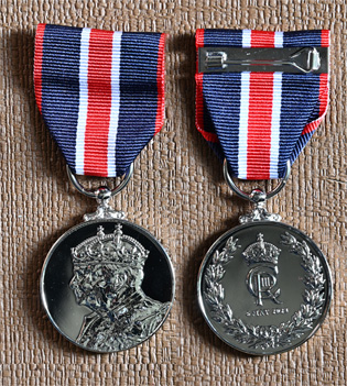 Front and reverse of the King Charles III Coronation Medal