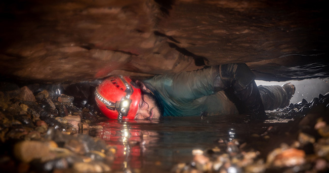 Joel Foyster in Gravel Duck, Redhouse Swallet cave. (Pic: Bartek Biela)