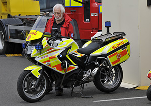 A MCRO team member Steve Holding checking out a Blood Bike.