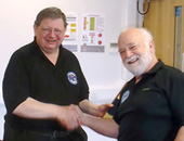 Anthony Rich (left) receiving his BCRC long service award from Bill Whitehouse (right), BCRC Chair)