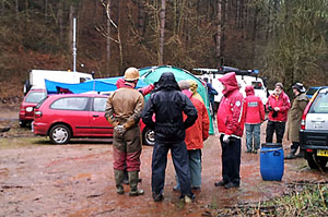 Team members waiting by the control point (in the rain!) for the start of the exercise