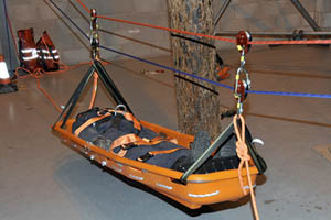 The stretcher on the Tyrolean Traverse, complete with 70kg casualty
