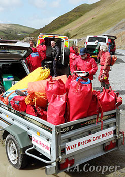 A trailer full of rescue equipment is checked at the control point.