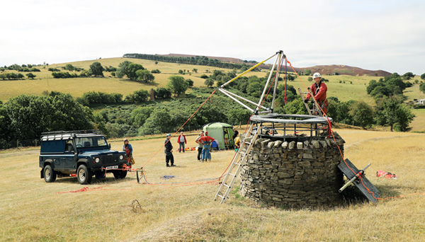 The Larkin frame rigged on the shaft top and team members descending (Picture: Bartek Biela)