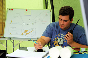 Gareth Rushton logging radio messages in the Control tent. (Picture: Bartek Biela)