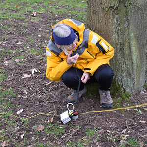 A team member operating a µHeyphone set.