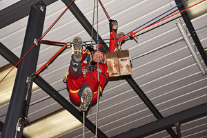 A team member on the haulage/rope rigging with the '50kg casualty'