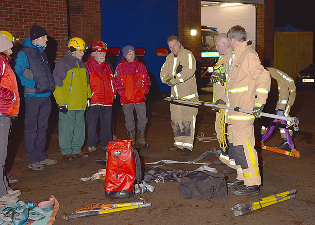 Members of Shropshire Fire and Rescue Service animal rescue unit talking through some of the kit.