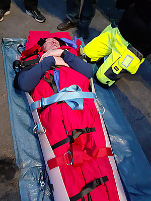 The casualty packed into the stretcher