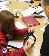 Emma Porter examining equipment on the Inspection course.