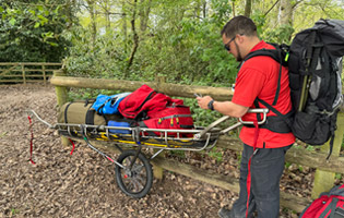 Setting off with the wheeled stretcher.